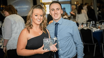 Nicola pictured with Rob, after receiving her award