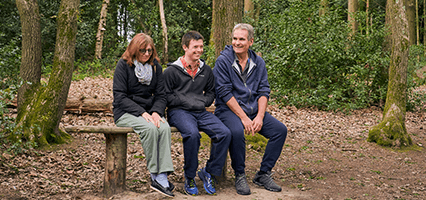 Richard and his parents in woodland