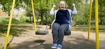 Juanita on a swing
