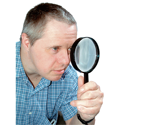 Image of a man with a magnifying glass