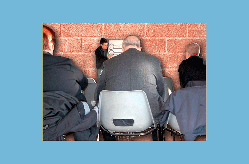 man presenting at meeting